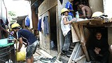 malaysia_migrant_dorm_305px.jpg