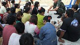 migrant_arrested_305px.jpg