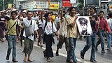 saffron_aung_san_305px.jpg