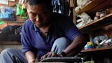 တီးတိန်မြို့က ဖိနပ်ချုပ်သမား