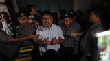 reuters-reporters-court-jun18-622.jpg