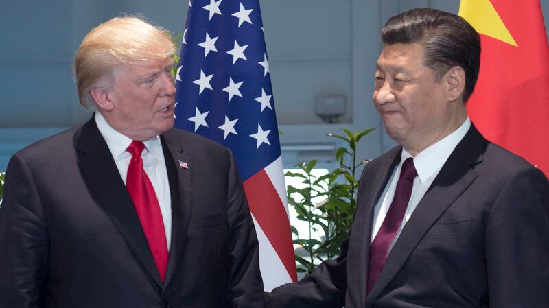 美国总统特朗普和中国国家主席习近平(右)在G20峰会上。(美联社)