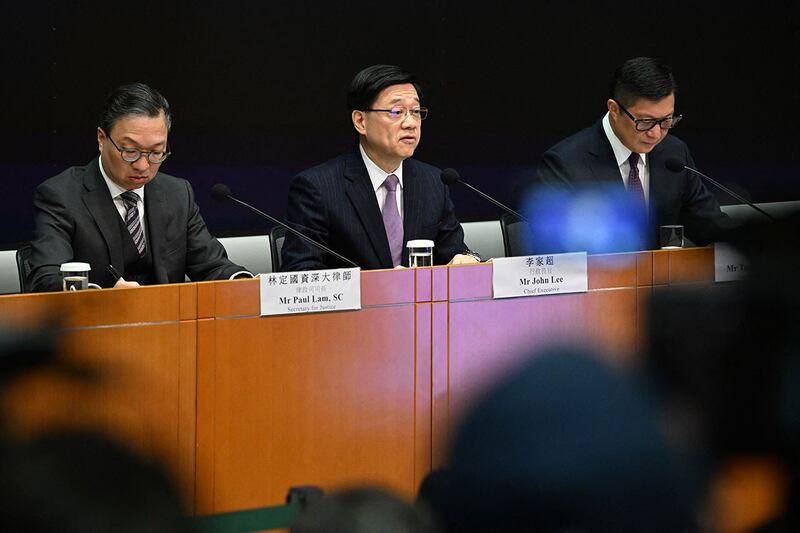 2024年1月30日,香港特首李家超在记者会上宣布,启动《基本法》23条立法谘询。(法新社)