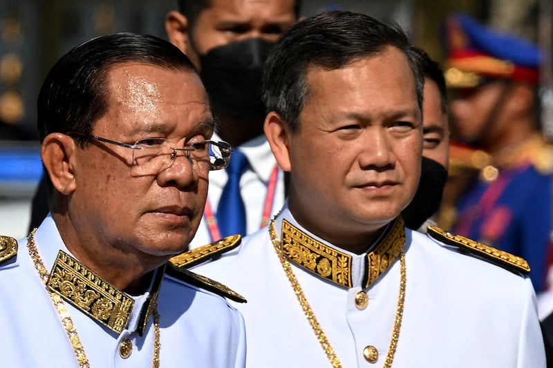 Cambodia's Senate President Hun Sen, left, and Cambodia's Prime Minister Hun Manet appear at a ceremony marking Cambodia's 71st Independence Day celebrations in Phnom Penh on Nov. 9, 2024.