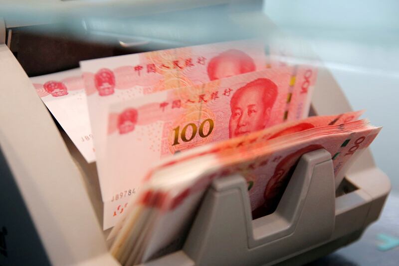 中国经济7月表现不佳,中国人民银行(央行)15日调降中期借贷便利(MLF)等两项关键利率,期以支撑疲软的经济增长。(路透社资料图片)