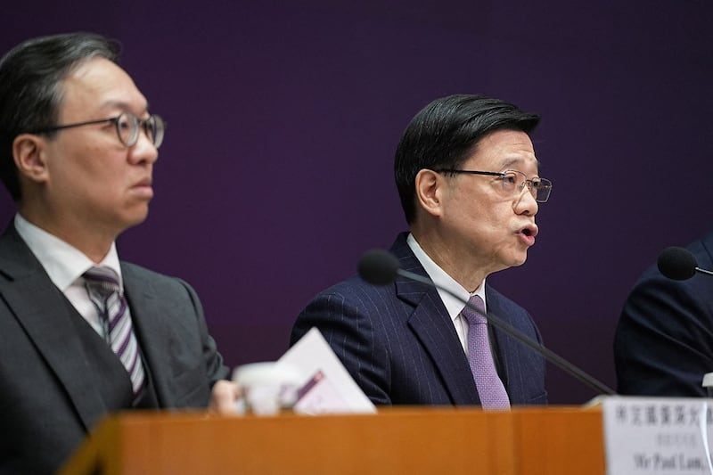 港府30日上午宣布启动《基本法》23条立法谘询,特首李家超召开记者会。(路透社)