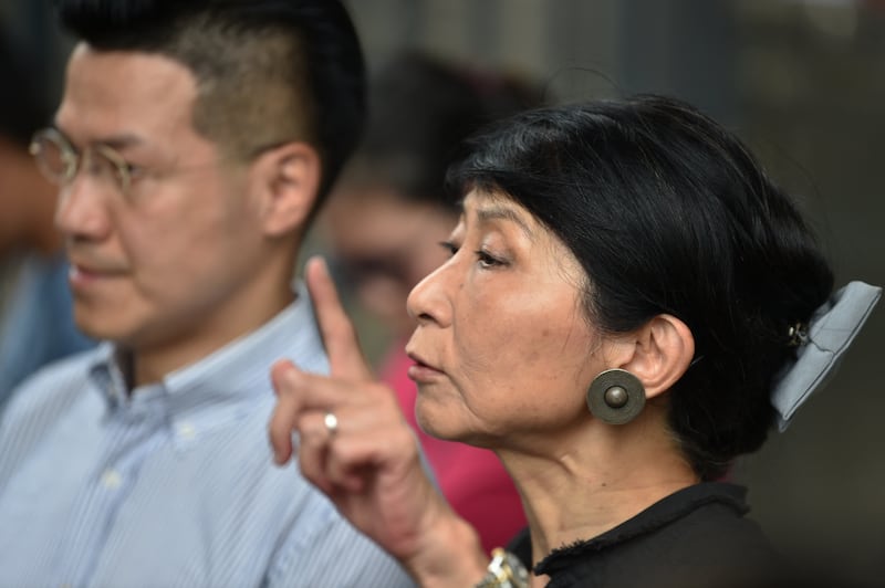 Claudia Mo and Gary Fan give a press conference next to the Legislative Council in Hong Kong on July 4, 2019.