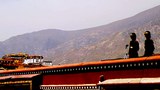 རྒྱ་ནག་གི་ལྷ་སར་དམ་བསྒྲགས་བྱེད་པ།