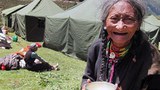 ས་འགུལ་གྱིས་གནས་འཚེ་ཕོག་པའི་བོད་མི།